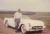 Kenneth Eugene Shirey with his Corvette, about 1957